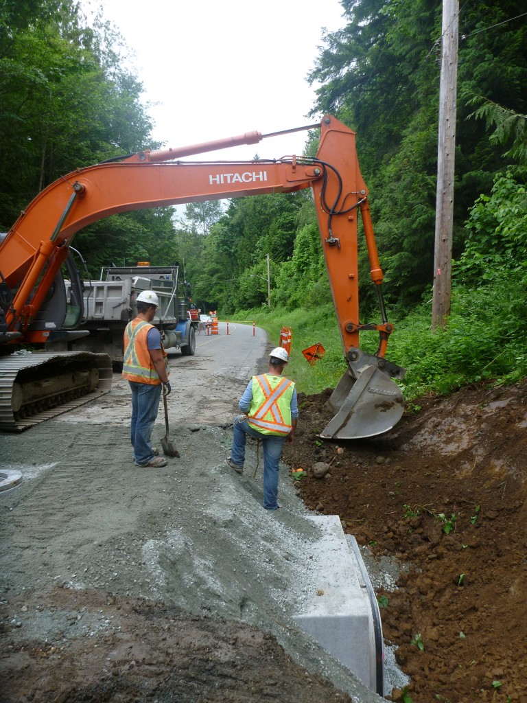 Cleaning up the end of the culvert.