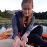 Jen with toadlet on kayak in pond at fraser valley british columbia